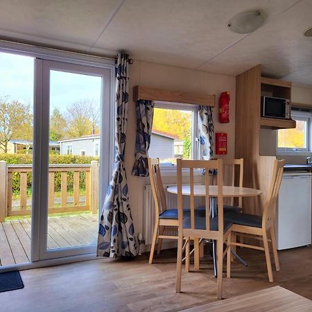 Strandhuis 'Het Kompas' Lauwersoog Exterior foto