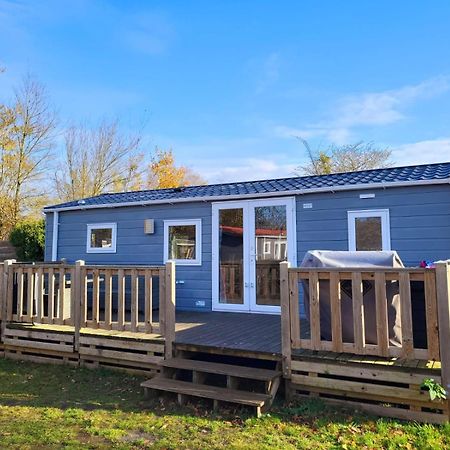 Strandhuis 'Het Kompas' Lauwersoog Exterior foto